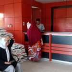 Kantor Pos Singkil Salurkan Bantuan Beras Bulog 10 Kg