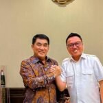 Ketua Panitia Munas APKASI 2025 Delis Julkarson Hehi Silaturahmi dengan Gubernur Sulut
